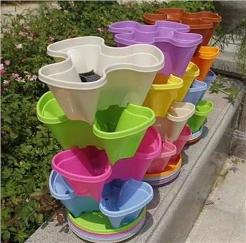 Vaso a torre verticale impilabile in plastica per sistema idroponico a effetto serra